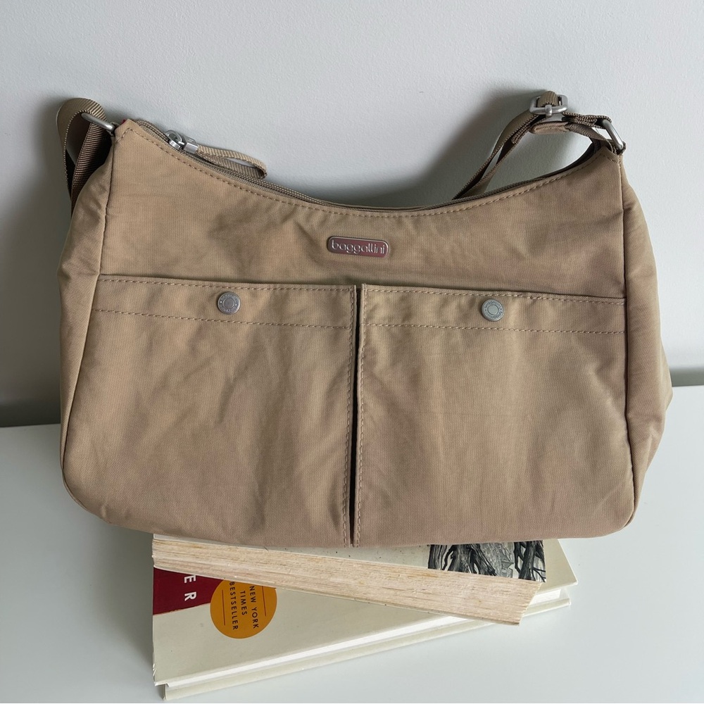 Baggalini brand women bag. Used but new looking. Middle sizes. Ten color.